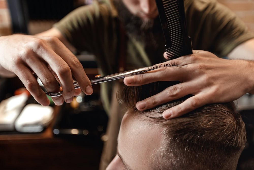 Men's haircut styling at 18|8 Fine Men's Salons in 4S Ranch